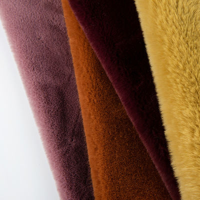 Materiale anteriore 100% poliestere tessuto di pelliccia finta di peluche per cappotto design personalizzato