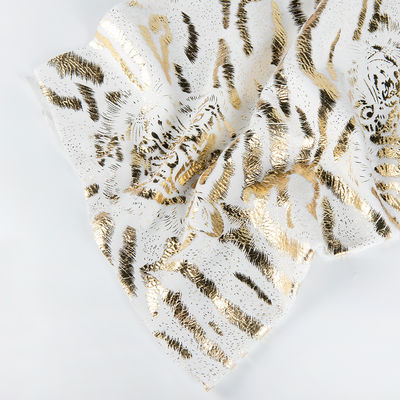 240gm poliestere morbido stella carta stampata oro bronzo pv pelusa tessuto per la produzione di giocattoli